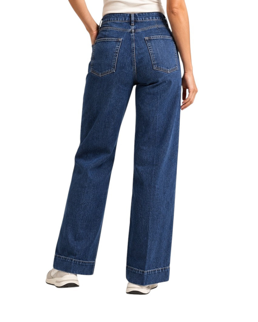 FRAME women’s jeans blue denim — back view on model